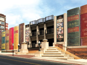 Здание библиотеки в виде полки с книгам ДОМАКС